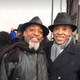 The Rev. Kenny Glasgow, standing with his half brother the Rev. Al Sharpton